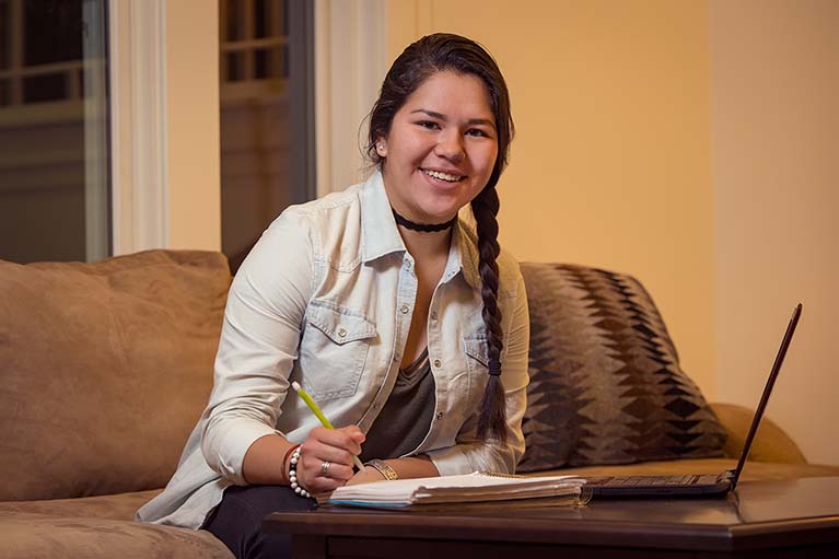 Native woman Studying