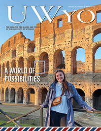 woman in front of ruins